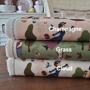 May include: Three rolls of fabric with a repeating pattern of figures, trees, and umbrellas. The top roll is labeled "Champagne", the middle "Grass", and the bottom "Cloud". The fabric has a vintage aesthetic with a soft color palette.