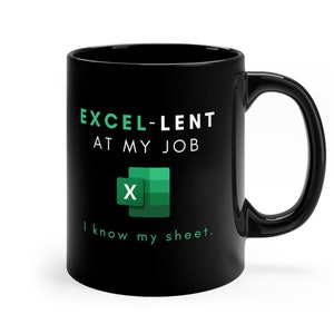 May include: Black coffee mug with the text "EXCEL-LENT AT MY JOB" and a green Excel logo. The text below the logo reads "I know my sheet."