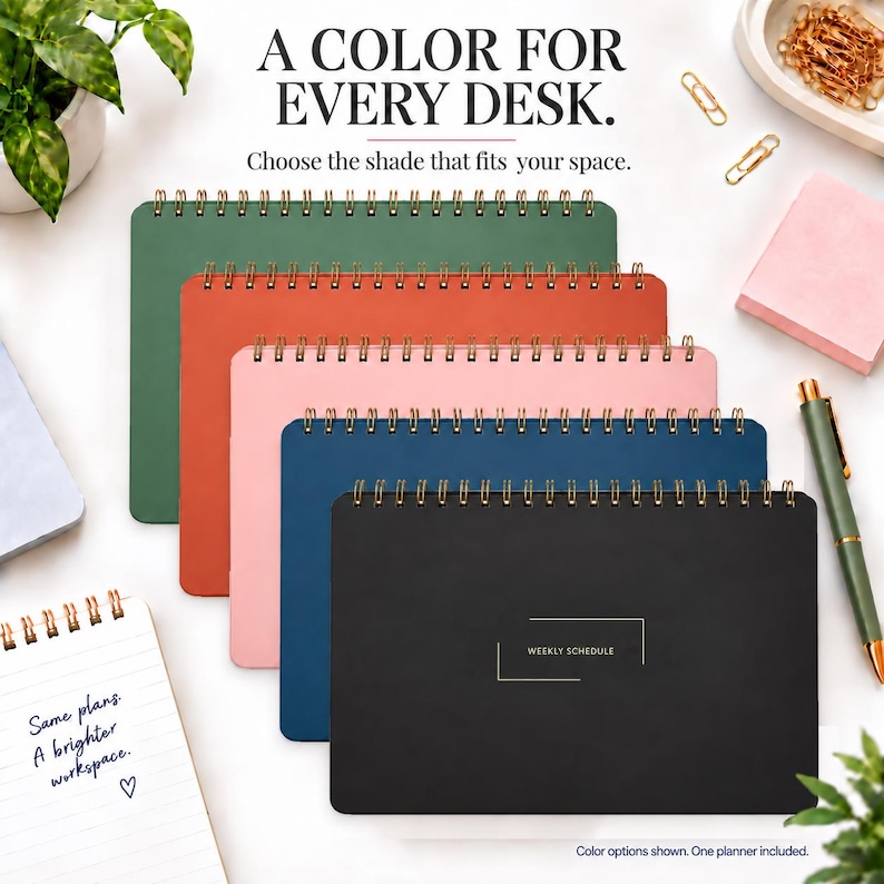 May include: A stack of five spiral-bound planners in green, orange, pink, blue, and black. The black planner features the text WEEKLY SCHEDULE. The image includes the text A COLOR FOR EVERY DESK. Choose the shade that fits your space.