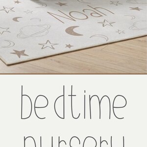 May include: A nursery scene featuring a crib with a patterned blanket, a rug with celestial designs, and a rocking chair. The blanket has a patchwork design with stars, a moon, and a teddy bear. The rug has a celestial pattern.