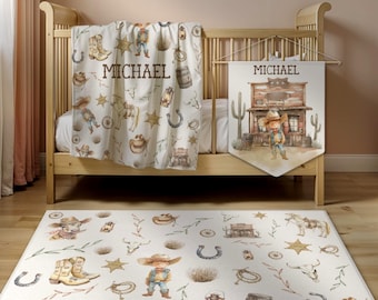 May include: A white baby blanket, a wall banner, and a rectangular rug featuring a repeating watercolor pattern of cowboys, boots, hats, horseshoes, stars, lanterns, and skulls. The blanket and banner both display the name MICHAEL in brown text.