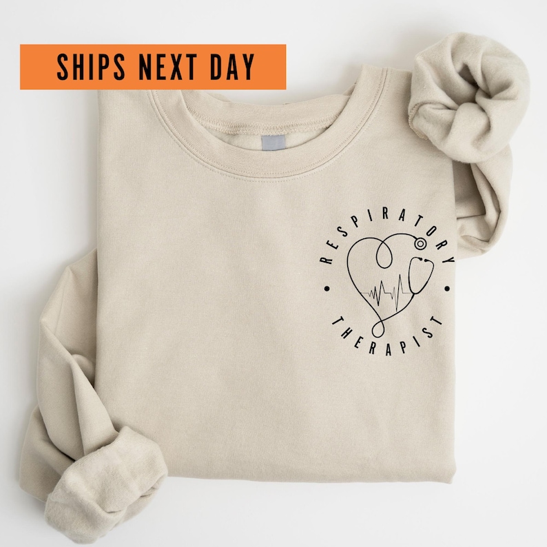 a t - shirt with a heart on it and a bow on the back