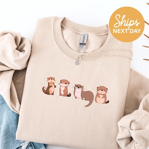 otter sweatshirt, cute otter hoodie, sea otter crewneck, otter lover gifts, otter mom sweatshirt, animal lover gifts, wildlife crewneck