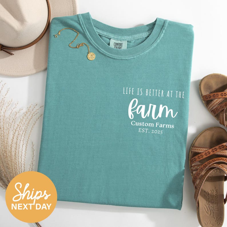 a t - shirt that says, life is better at the farm