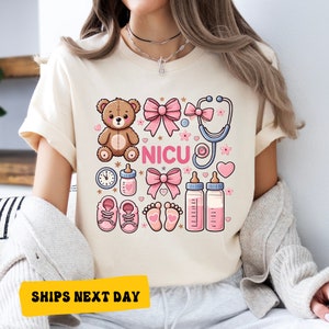 a woman wearing a t - shirt that says nicu with a teddy bear and