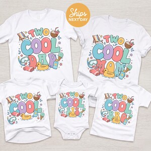 May include: Five white t-shirts and one white baby bodysuit featuring colorful summer graphics. The designs include beach chairs, coconuts, ice cream, snorkels, towels, and rubber ducks, with text reading Two Cool Dad, Mom, Sis, Bro, and Two Cool.