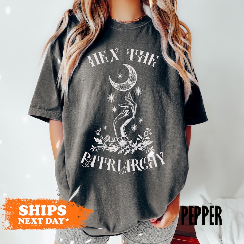 a woman wearing a t - shirt that says fix the pittilargy