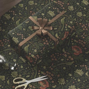 Vintage-inspired wrapping paper featuring a rich green botanical design with detailed English roses and intertwining foliage, influenced by classic William Morris Arts and Crafts patterns. The small-scale floral repeat creates an elegant, timeless look reminiscent of traditional floral wrapping paper, antique European papier cadeau floral vintage, and heritage Christmas gift wrap. Ideal for luxury gift wrapping, holiday presents, weddings, and cottagecore or classic botanical aesthetics.