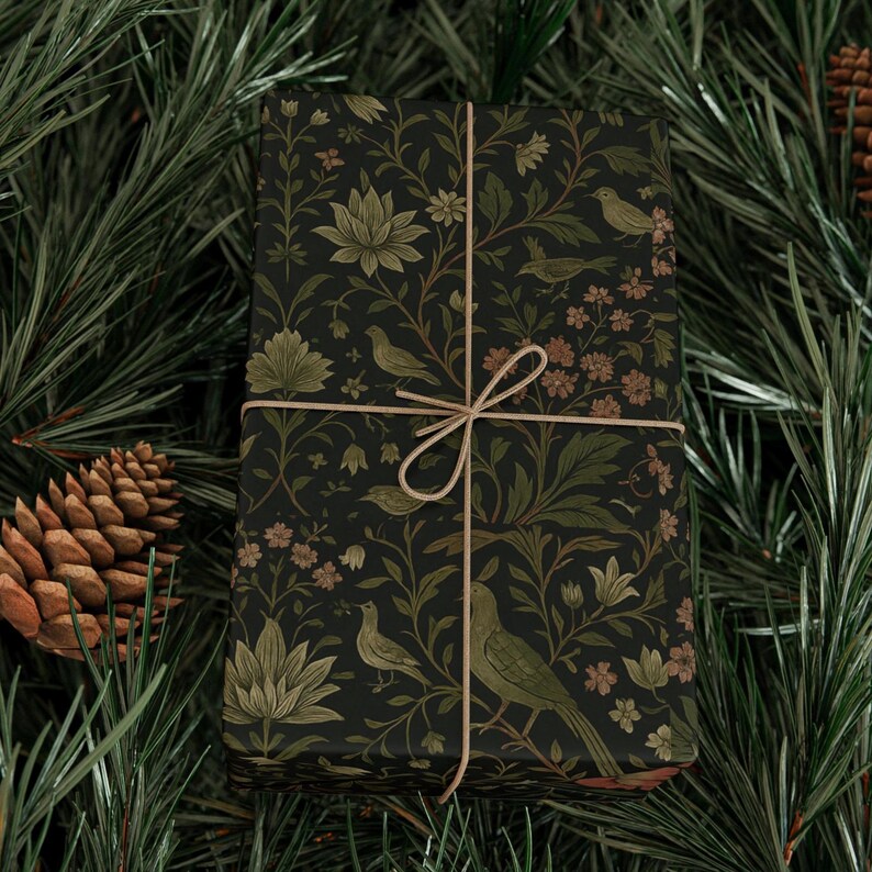 Vintage-inspired wrapping paper featuring a rich green botanical design with detailed English roses and intertwining foliage, influenced by classic William Morris Arts and Crafts patterns. The small-scale floral repeat creates an elegant, timeless look reminiscent of traditional floral wrapping paper, antique European papier cadeau floral vintage, and heritage Christmas gift wrap. Ideal for luxury gift wrapping, holiday presents, weddings, and cottagecore or classic botanical aesthetics.