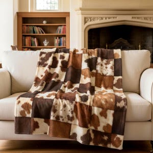 Manta patchwork con estampado vaca western efecto piel vaca sintética velveteen afelpado dormitorio estilo farmhouse rústica estilo country