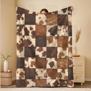 Manta patchwork con estampado vaca western efecto piel vaca sintética velveteen afelpado dormitorio estilo farmhouse rústica estilo country