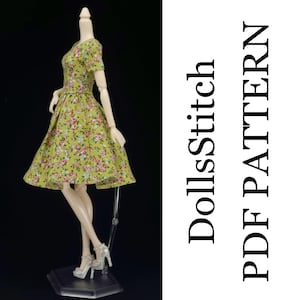 May include: A green floral print dress with short sleeves and a fitted waist. The dress is displayed on a doll with silver heels. The text "DollsStitch PDF PATTERN" is printed vertically on the right side of the image.