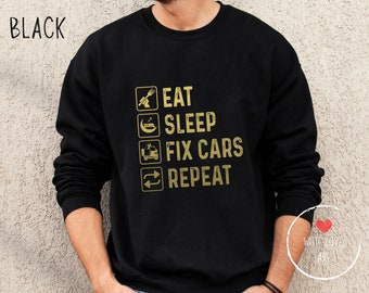 Sudadera «Come, duerme, arregla coches, repite» - Regalo para mecánicos