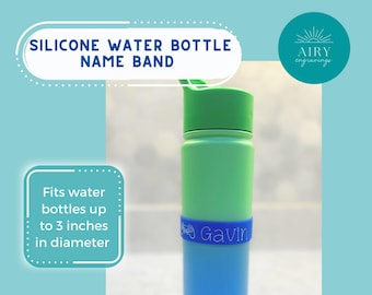 May include: A green and blue water bottle with a silicone name band that says "Gavin". The band fits water bottles up to 3 inches in diameter.