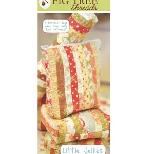 May include: A stack of quilted bags in various sizes, featuring a patchwork design with red, yellow, and floral patterns. The bags are made from Jelly Roll leftovers. The text "Little Jellies" is visible.