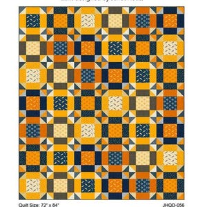 May include: A quilt pattern called "Round and About" designed by Janet Houts. The quilt is made up of squares and triangles in shades of yellow, orange, blue, and brown. The quilt is 72 inches by 84 inches.