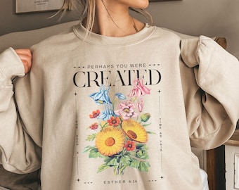 Puede incluir: Sudadera beige con un gráfico floral y el texto "Perhaps you were created for such a time as this - Esther 4:14"