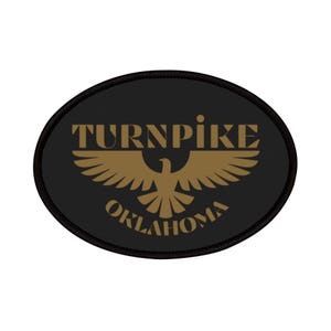 May include: Black oval patch with the words "TURNPIKE OKLAHOMA" in gold lettering. A gold eagle with outstretched wings is centered below the word "TURNPIKE". The patch has a black border.