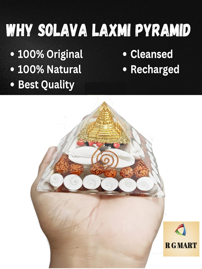 May include: A white crystal pyramid with gold accents and red beads. The pyramid is filled with white seashells, brown beads, and a copper wire spiral. The pyramid is being held in a person's hand. The text "WHY SOLAVA LAXMI PYRAMID" is at the top of the image. The text "100% Original", "100% Natural", "Best Quality", "Cleansed", and "Recharged" are listed below the pyramid. The text "RG MART" is in the bottom right corner of the image.
