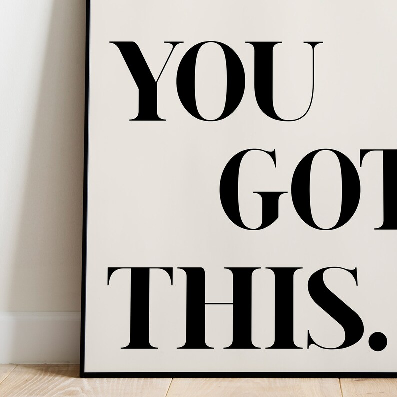 May include: Black and white motivational poster with the text "YOU GOT THIS."