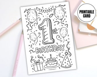 May include: Black and white printable first birthday card with balloons, confetti, a gift, cake, and party hat. The card features the text "1st Birthday" and the words "Printable Card" in a circle.