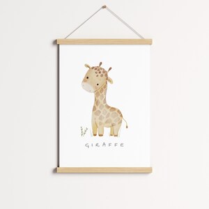 May include: A watercolour illustration of a giraffe with brown spots on a white background. The giraffe is standing on a patch of green grass. The word "GIRAFFE" is written in brown text below the giraffe.