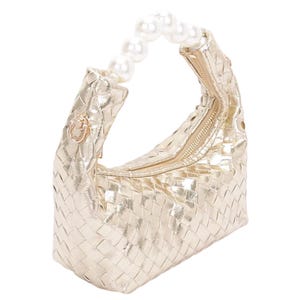 Bolso de mano bonito y elegante, dorado