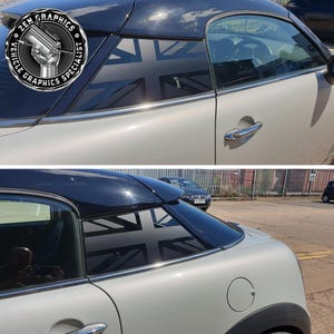 May include: A white Mini Cooper with a black roof, featuring a Union Jack design on the rear window. The car has chrome detailing and the "ZEN GRAPHICS VEHICLE GRAPHICS SPECIALIST" logo is displayed.