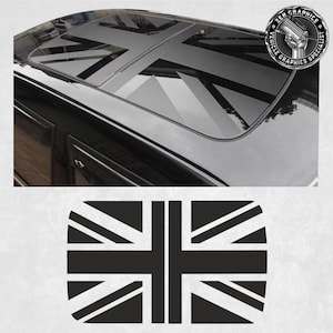 Pode incluir: Adesivo de bandeira Union Jack preto e branco. O adesivo é projetado para ser aplicado no teto solar de um carro.