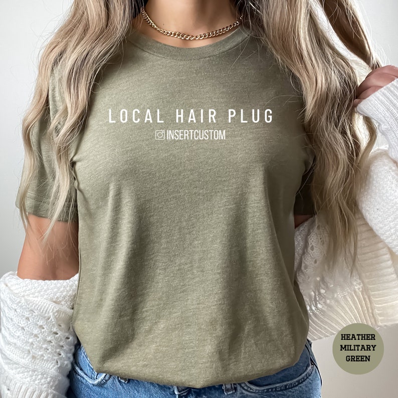 a woman with blonde hair wearing a green shirt