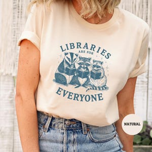 a woman wearing a shirt that says librarians are for everyone