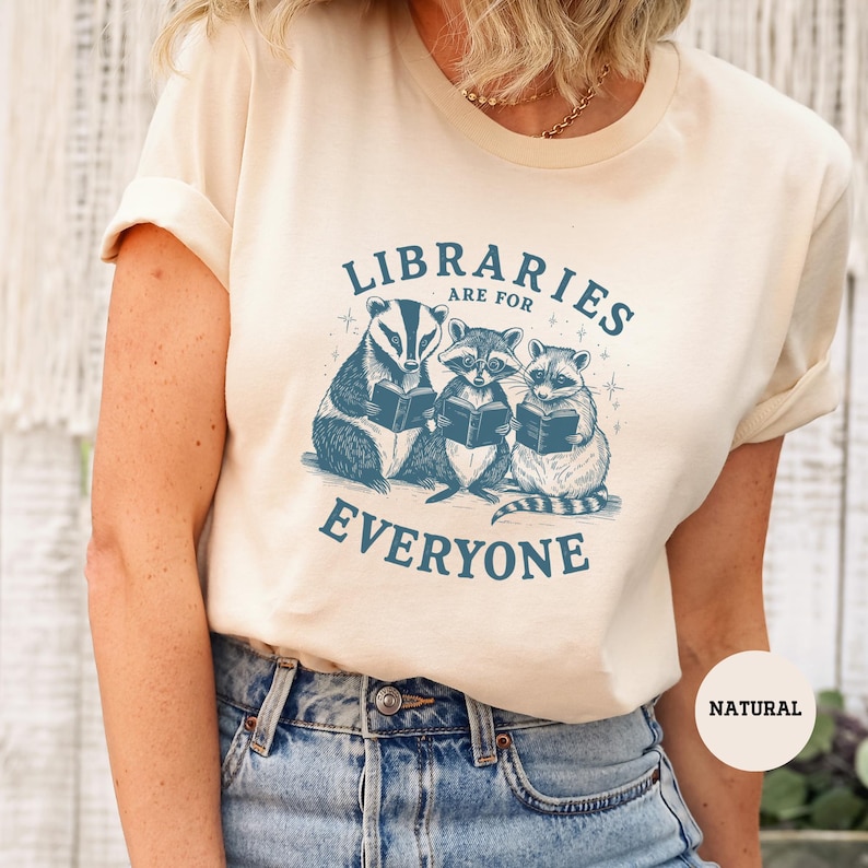a woman wearing a shirt that says librarians are for everyone