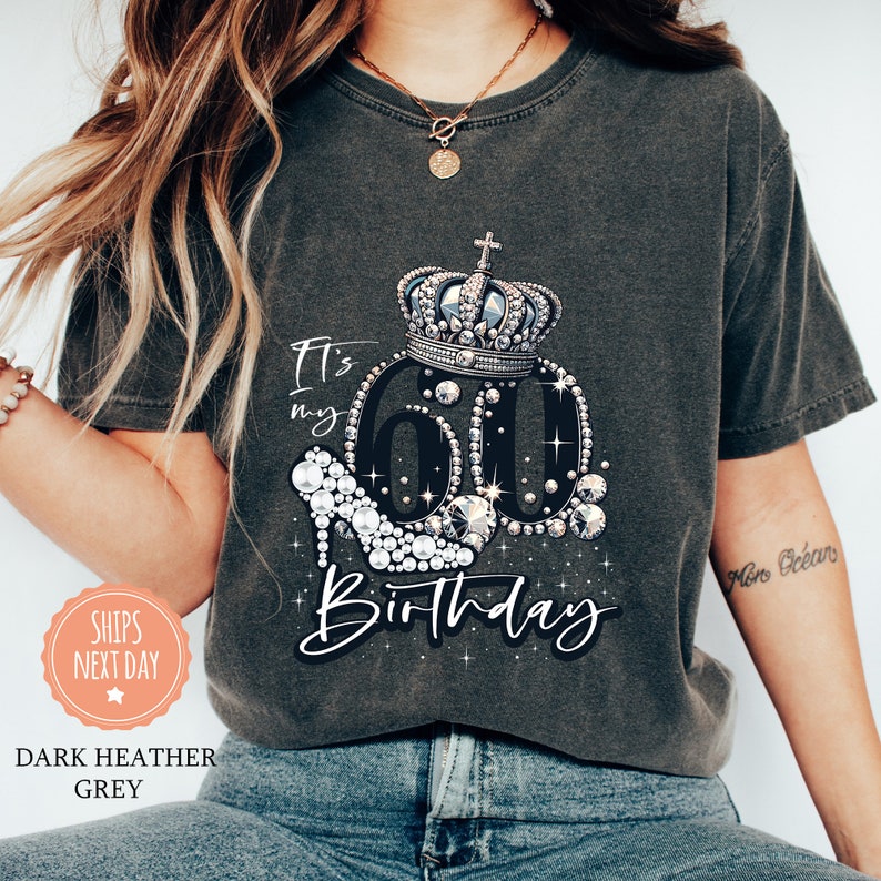 a woman wearing a birthday shirt with a crown on it