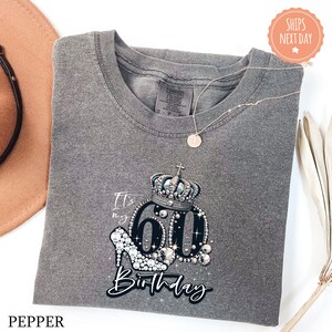 a hat, sunglasses, and a t - shirt with the words 60th birthday on