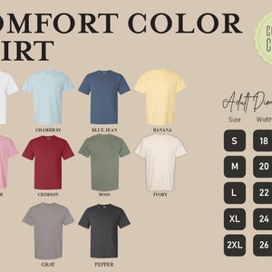 May include: A chart showing 12 different colors of t-shirts with the text "Comfort Color Shirt" at the top. The chart also includes a size chart with the text "Adult Dimensions" and the sizes S, M, L, XL, and 2XL with corresponding width and length measurements in inches.
