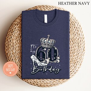 a blue birthday shirt with a crown on it