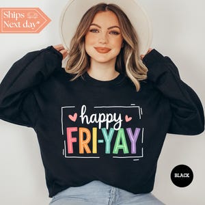 May include: Black sweatshirt with the text "happy FRI-YAY" in rainbow colors and white hearts.