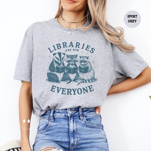 a woman wearing a shirt that says librarians are for everyone