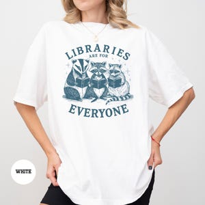 a woman wearing a white shirt that says librarians are for everyone