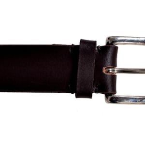 May include: A brown leather belt with a silver buckle.
