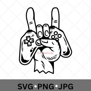 May include: Black and white graphic of a hand making the rock and roll hand gesture, holding two video game controllers. The controllers are detailed with buttons and a directional pad. The bottom of the image has the text "SVG • PNG • JPG".