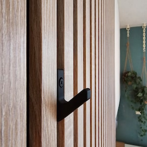 Coat or wardrobe hook for akupanel, acoustic wall panels.