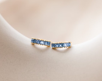 Blue Topaz Huggie Hoop Earrings: 14K Gold Plated Sterling Silver