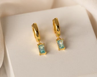 Blue Topaz Huggies: 14k Gold Plated Sterling Silver Birthstone Earrings