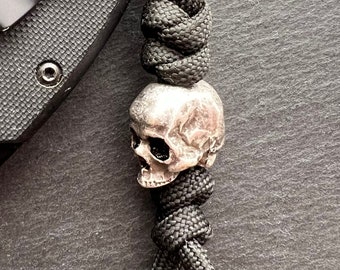 Buy Double Sided Skull Face Knife Beads Paracord Tools EDC Lanyard Pendants  Accessories Hanging Umbrella Rope Zipper Charm Paracord Bead Online in  India 