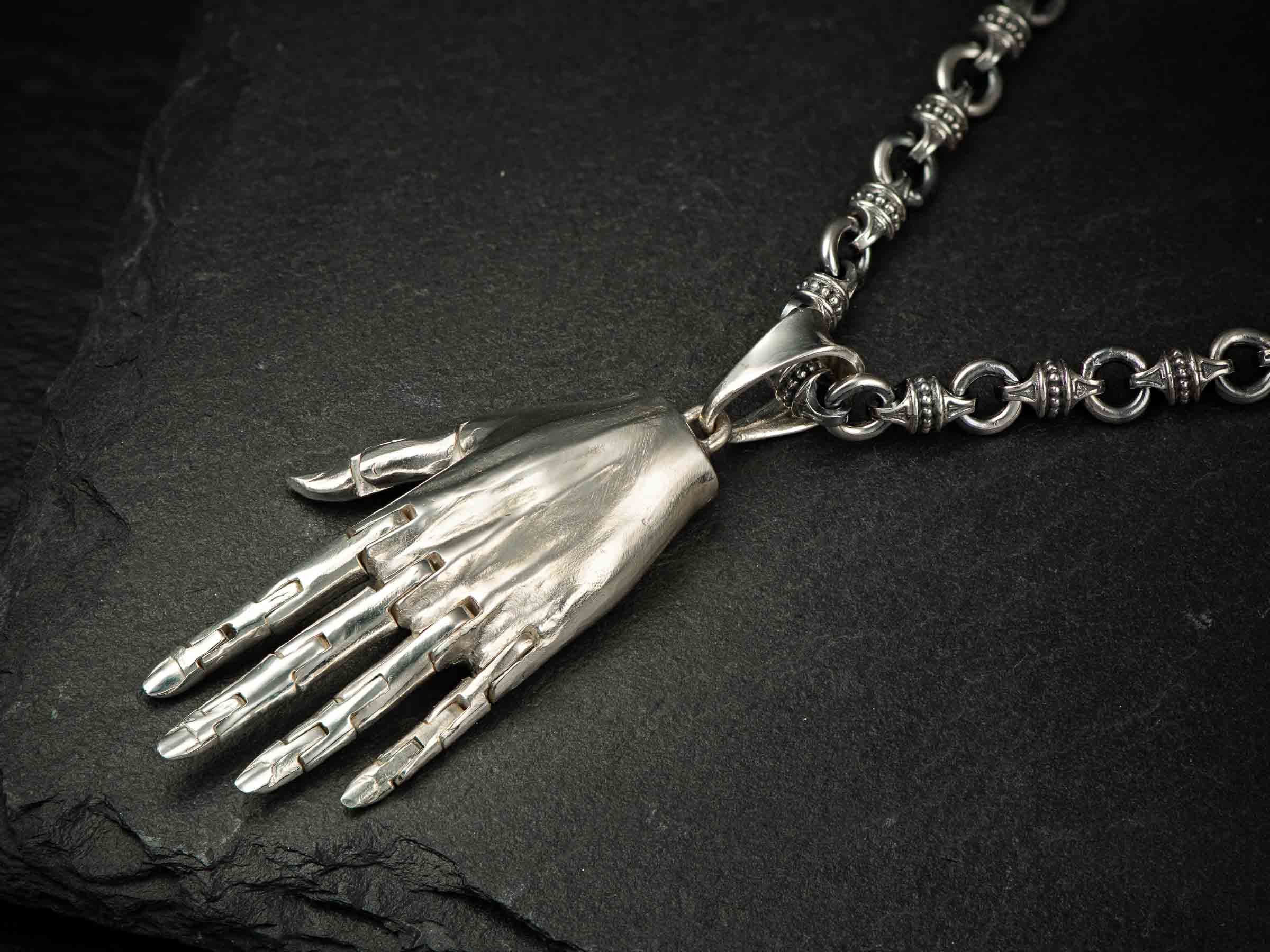 Articulated Sterling Silver Hand Pendant