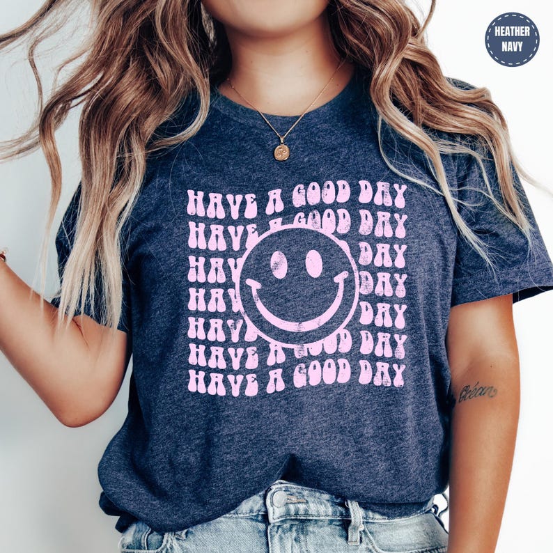 a woman wearing a t - shirt that says have a good day have a good