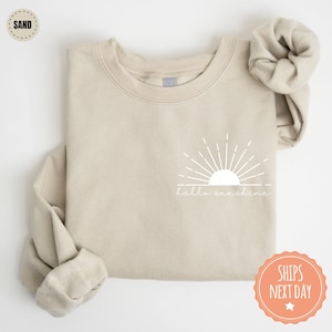 a t - shirt with a bow on the back of it