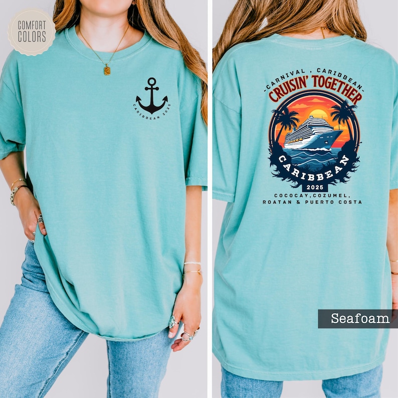 a woman wearing a turquoise shirt with an anchor on it