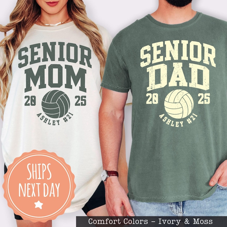 two people wearing t-shirts with the text "SENIOR MOM" and "SENIOR DAD" printed on them, along with a volleyball graphic.